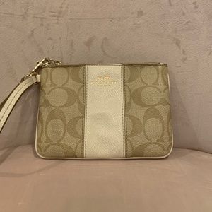 White and Tan Coach Signature Wristlet